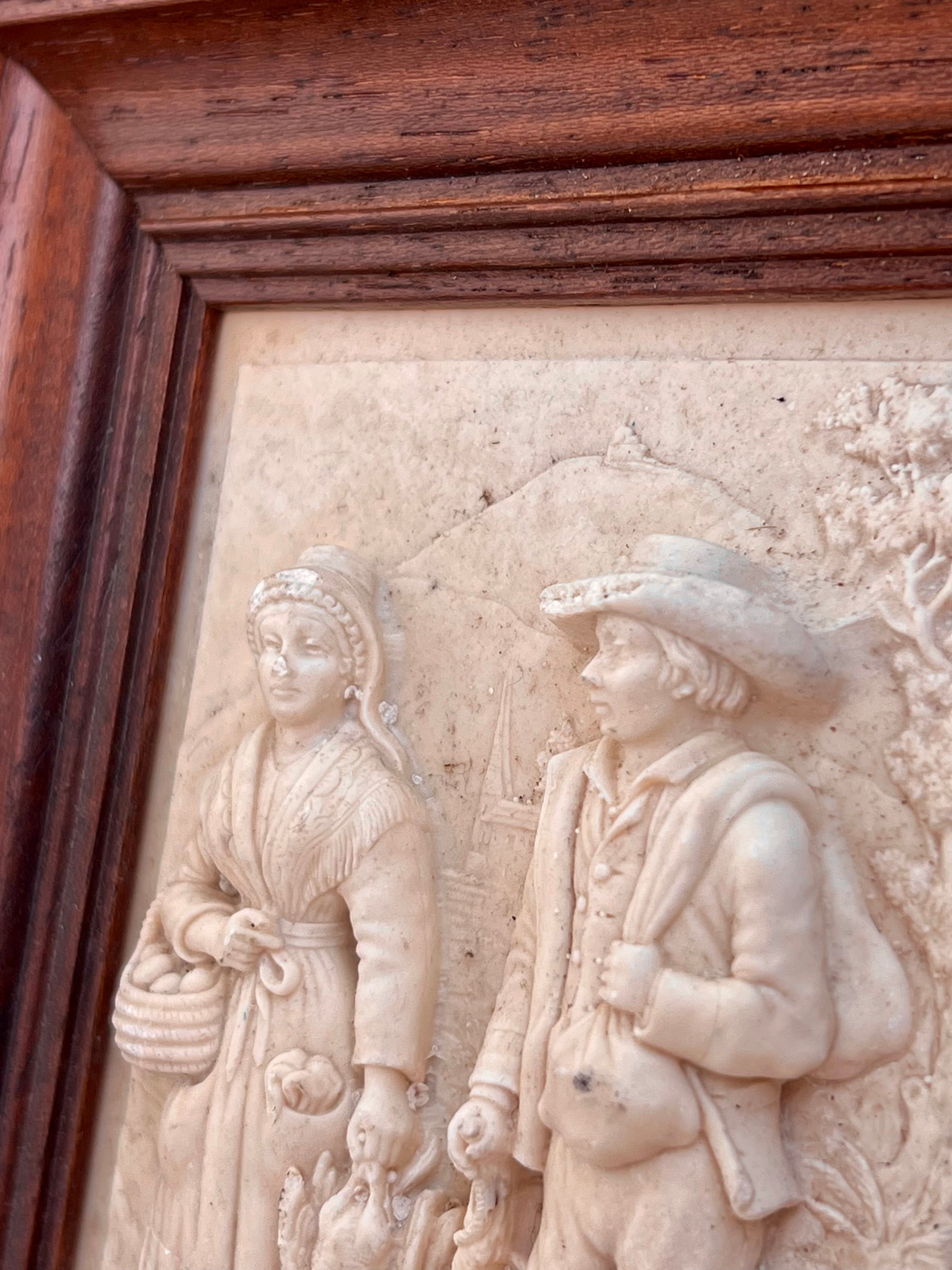 cadre en bas relief signé C.F. Becker.