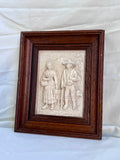 cadre en bas relief signé C.F. Becker.